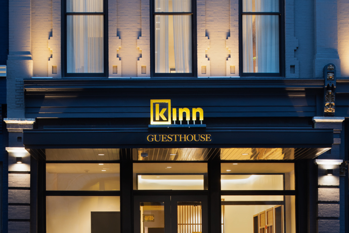 Exterior image of the Kinn Guesthouse entrance
